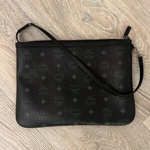 All black authentic MCM pouch